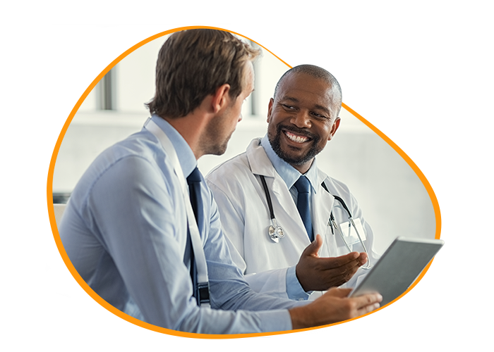 Two Healthcare professionals sharing information.