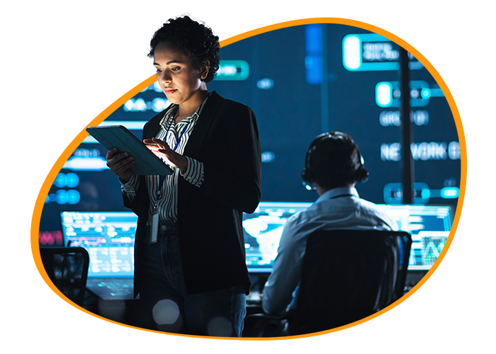 Illustration of a female IT specialist working in an office.