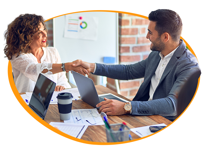 Illustration of a male and female business owners chaking hands at a coffee table.